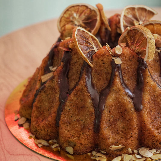 Corona de naranja con amapola